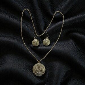 Elegant Silver Pendant and Earring Set